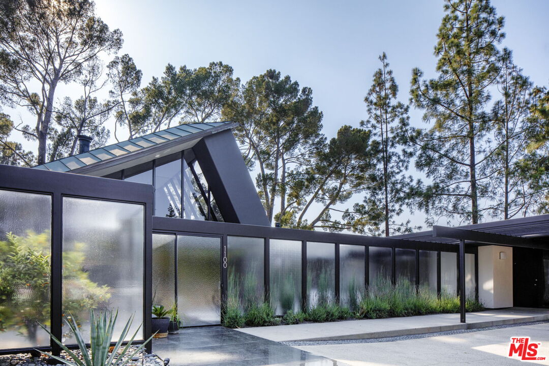 1100 Paso Alto Road Pasadena, CA 91105 - Photo 1 of 21 a front view of a house with garden