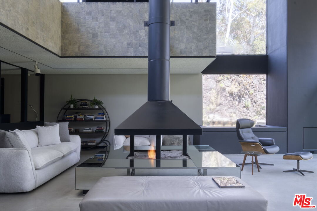 1100 Paso Alto Road Pasadena, CA 91105 - Photo 16 of 21 a living room with furniture and a window