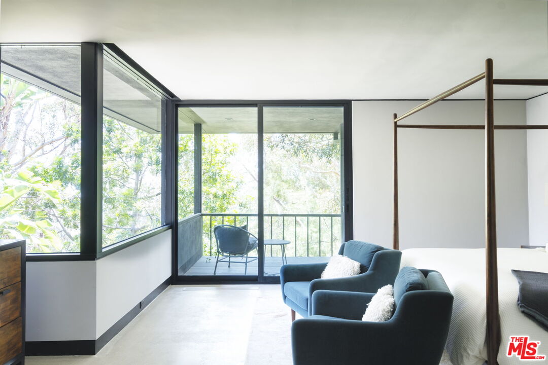 1100 Paso Alto Road Pasadena, CA 91105 - Photo 18 of 21 a living room with furniture and a large window