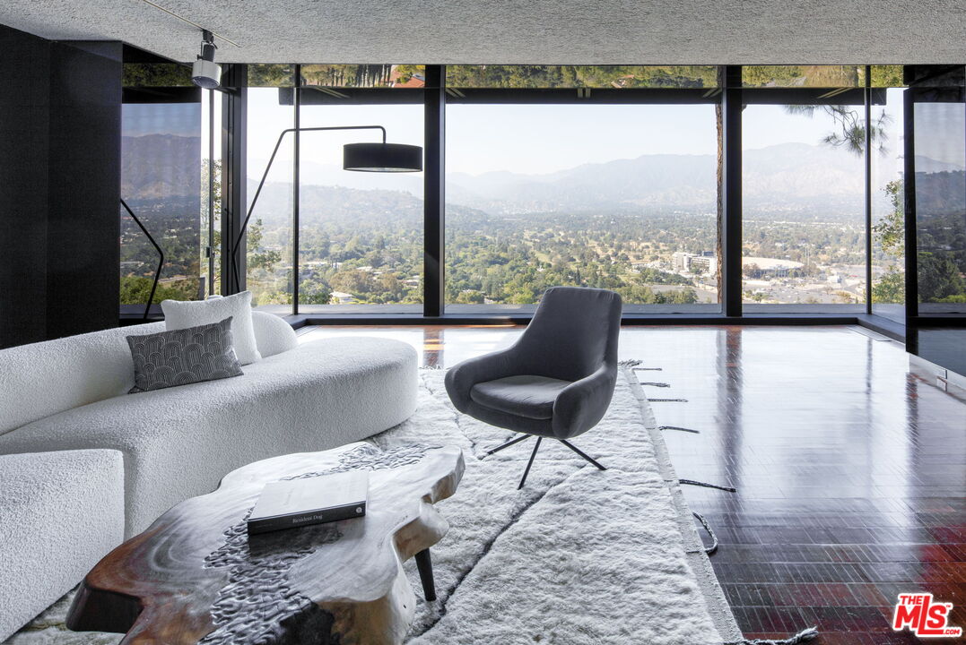 1100 Paso Alto Road Pasadena, CA 91105 - Photo 5 of 21 a living room with furniture and a large window