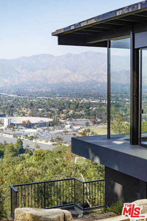 1100 Paso Alto Road Pasadena, CA 91105 - Photo 6 of 21 a view of a city from a balcony