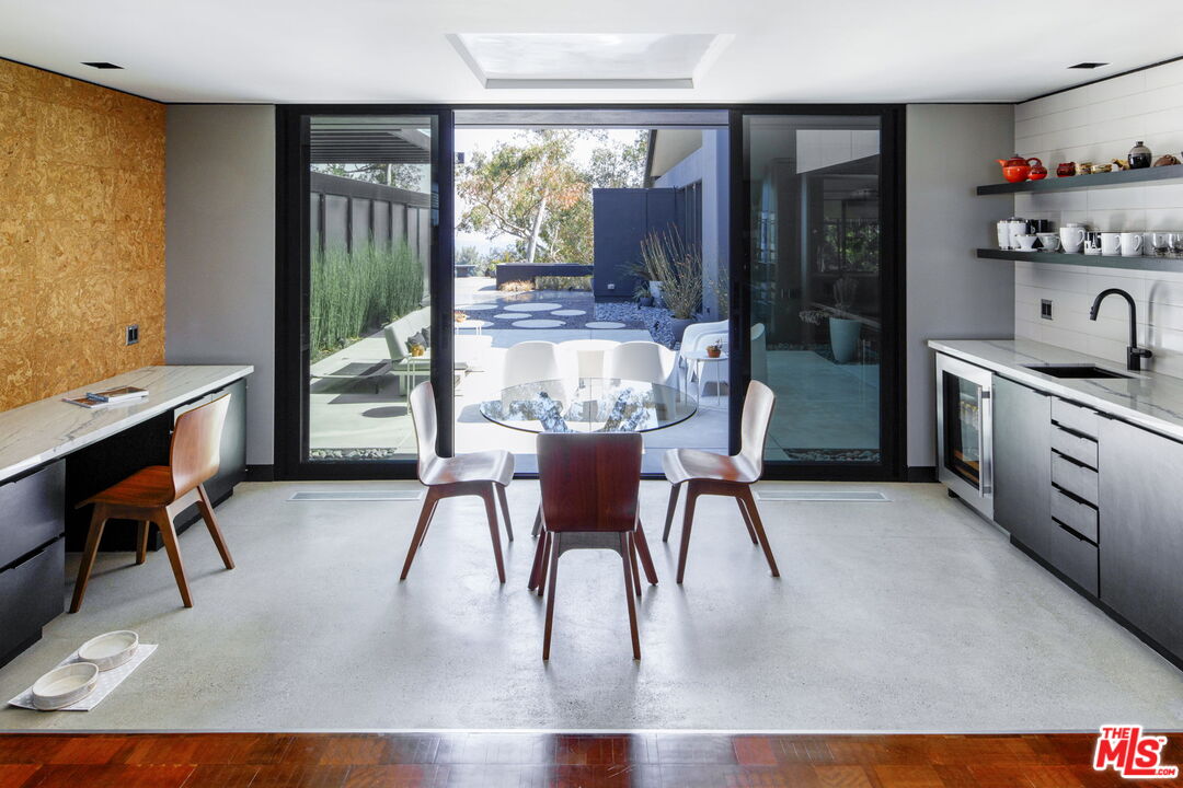 1100 Paso Alto Road Pasadena, CA 91105 - Photo 9 of 21 a view of a dining room with furniture window and outside view