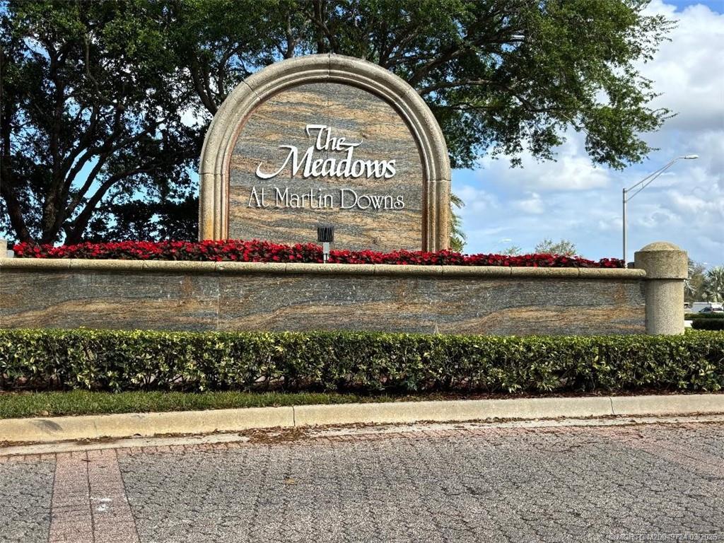 1559 Southwest Waterfall Boulevard Palm City, FL 34990 - Photo 1 of 19 Entry from Martin Downs Blvd