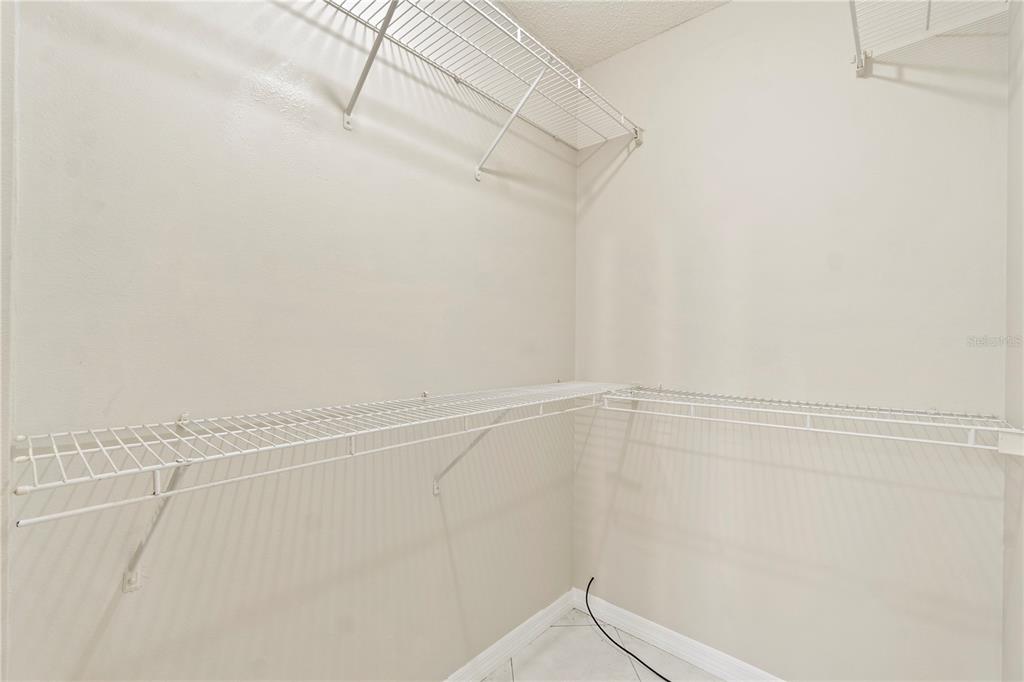 623 Red Oak Circle, Unit 121 Altamonte Springs, FL 32701 - Photo 15 of 24 a view of a room with racks on the wall