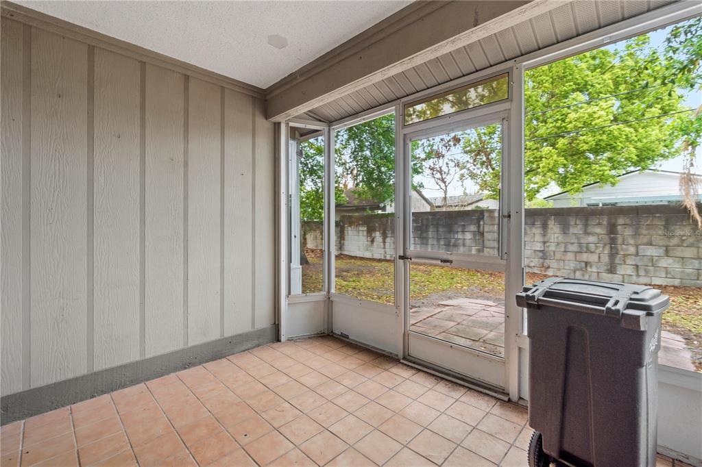 623 Red Oak Circle, Unit 121 Altamonte Springs, FL 32701 - Photo 21 of 24 wooden floor to ceiling window and an outdoor view