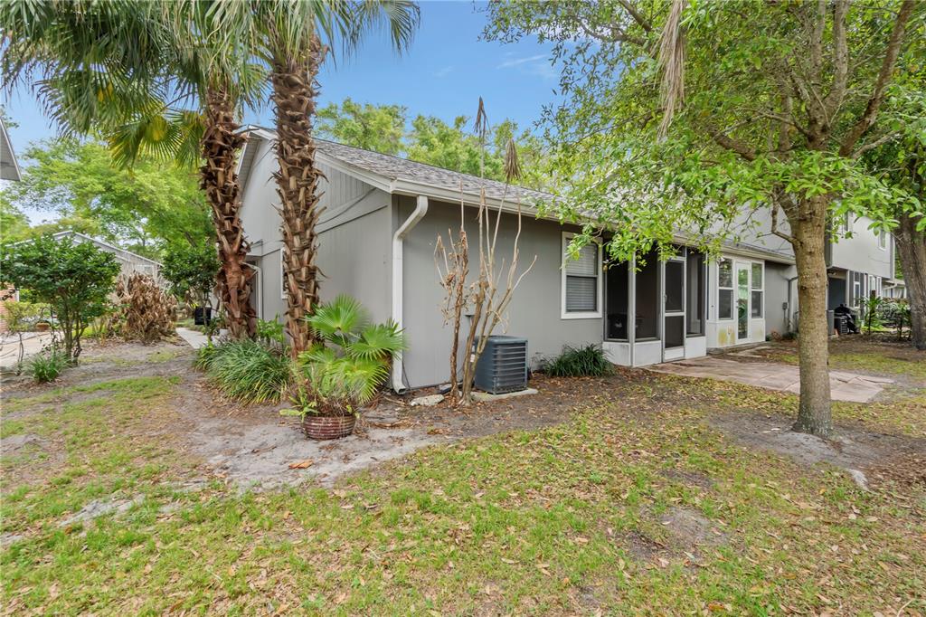 623 Red Oak Circle, Unit 121 Altamonte Springs, FL 32701 - Photo 24 of 24 a view of a house with a tree in the background