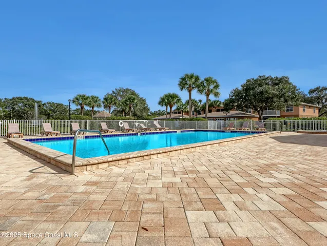 a view of an outdoor space and swimming pool