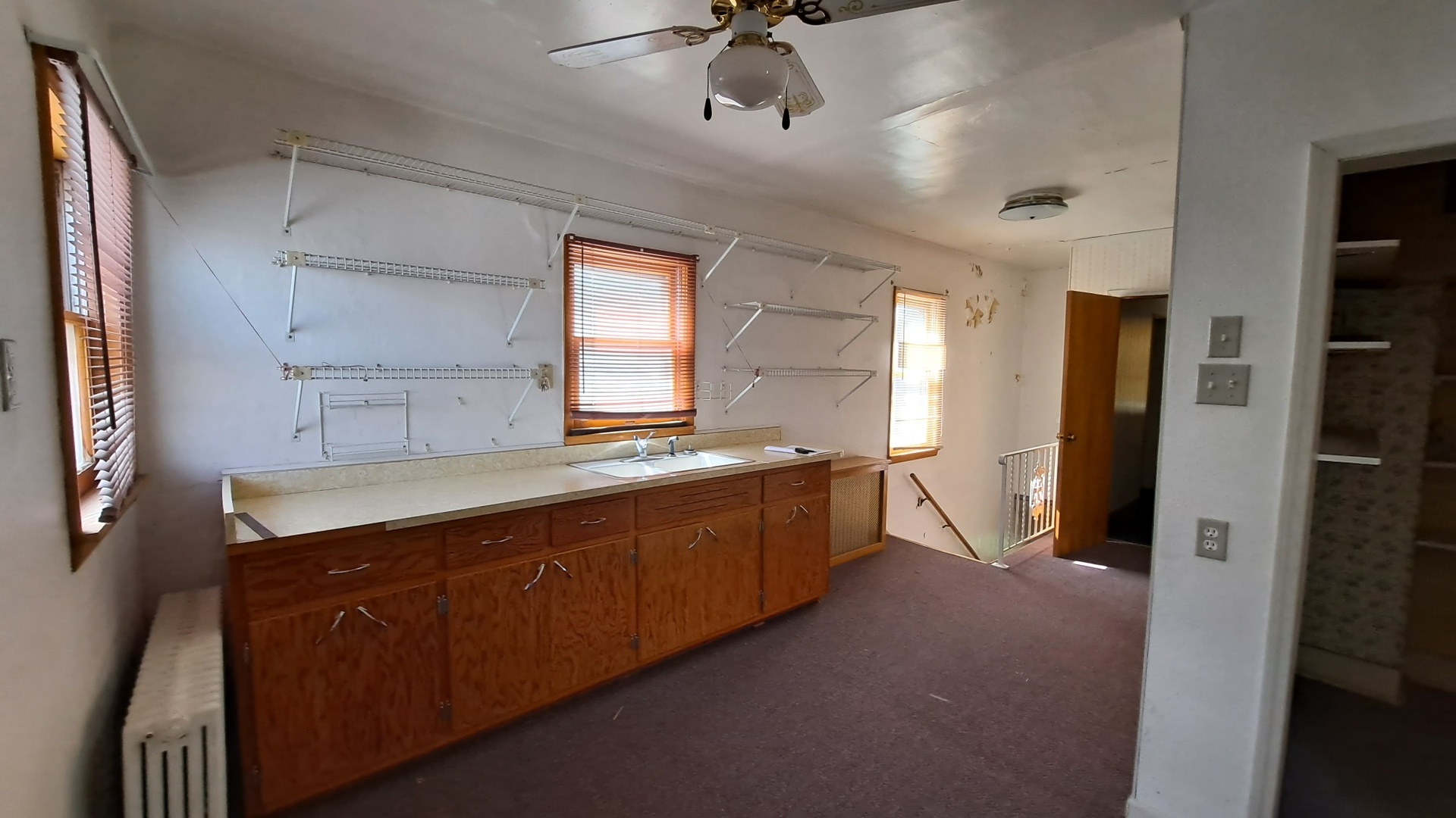 12 7th Street LaSalle, IL 61301 - Photo 11 of 16 a large bathroom with a sink and a large mirror