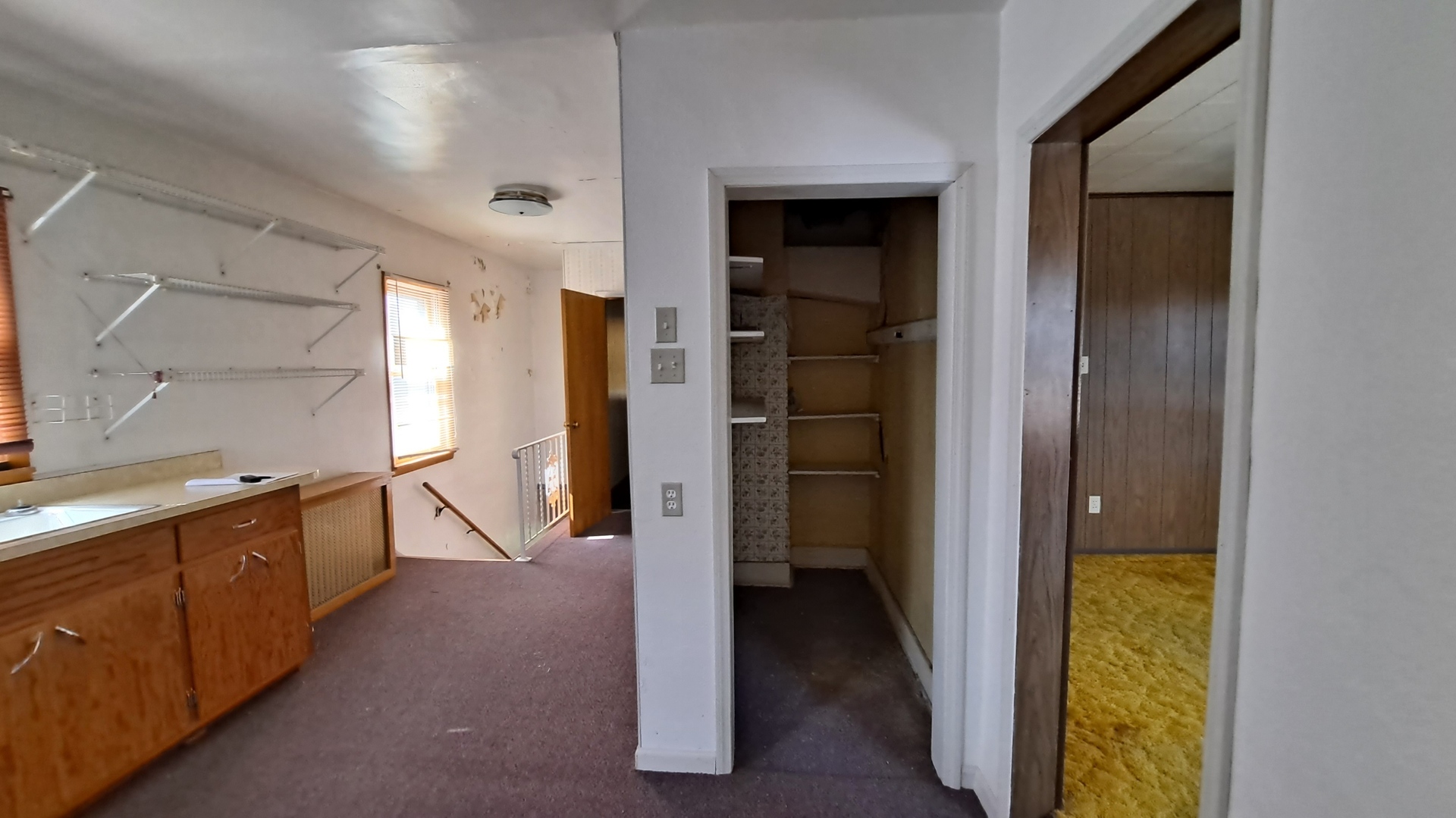 12 7th Street LaSalle, IL 61301 - Photo 12 of 16 a view of a hallway with wooden shelves