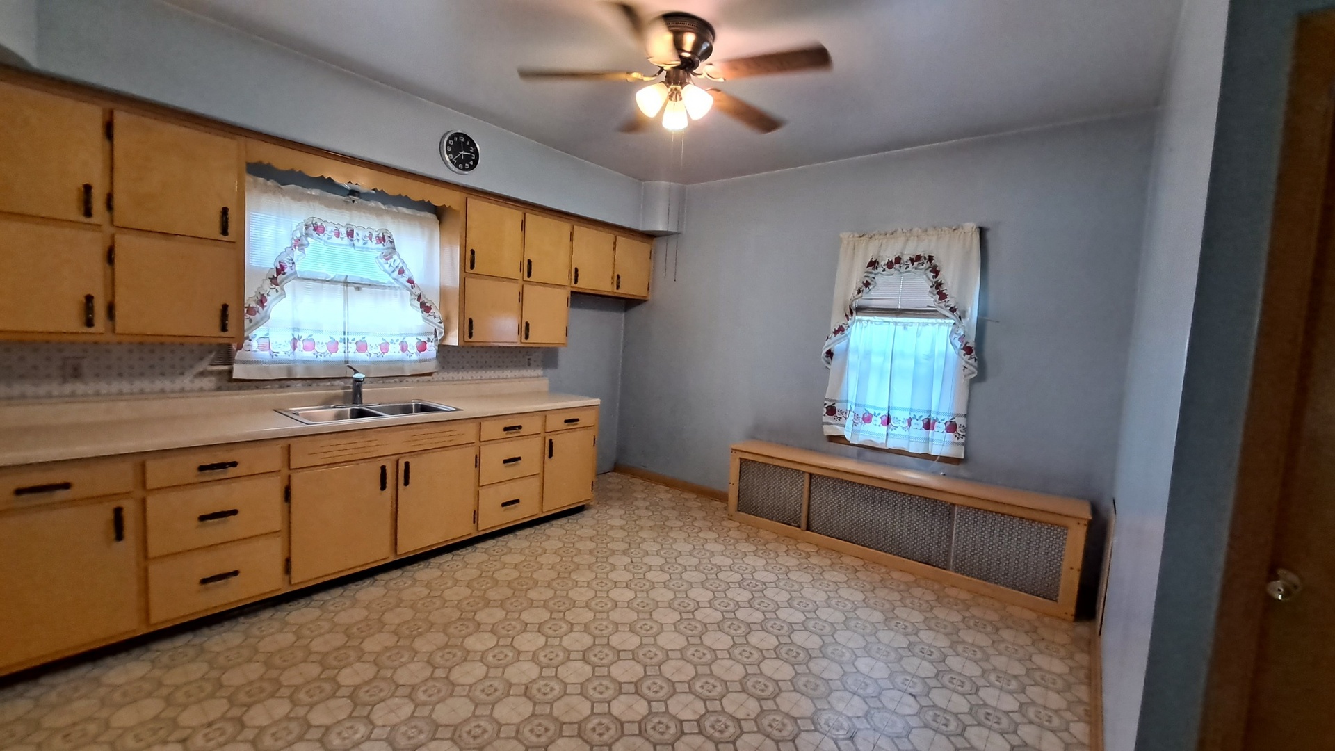 12 7th Street LaSalle, IL 61301 - Photo 2 of 16 a large kitchen with a lot of counter space and wooden floor