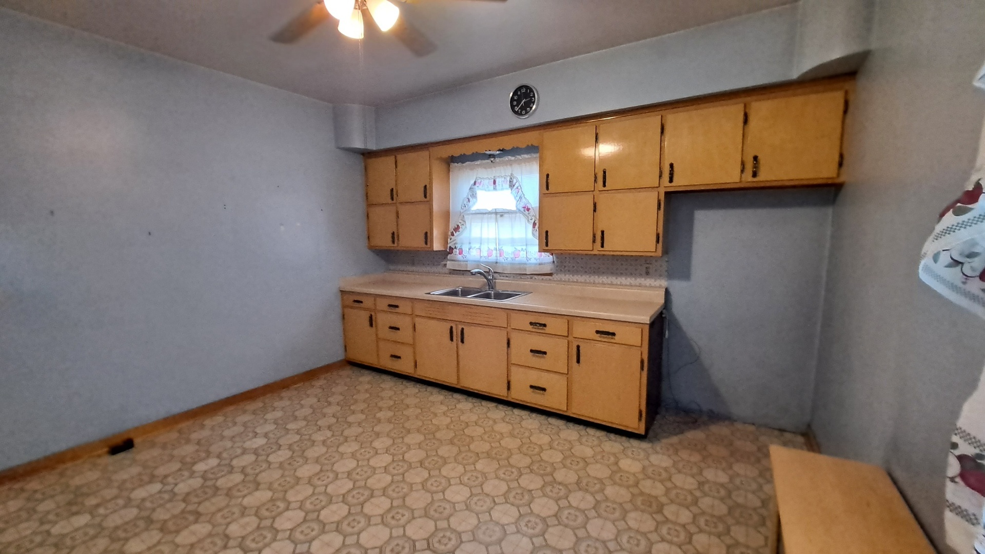 12 7th Street LaSalle, IL 61301 - Photo 3 of 16 a kitchen with stainless steel appliances granite countertop a stove a sink and a microwave