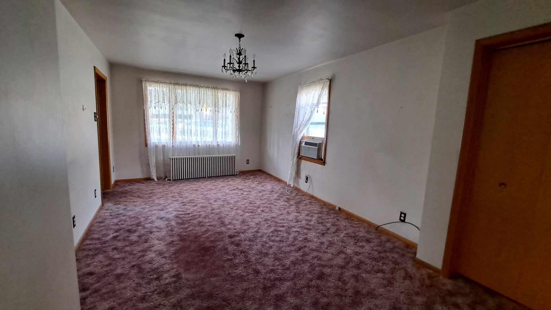 12 7th Street LaSalle, IL 61301 - Photo 4 of 16 a view of room with window and hardwood floor