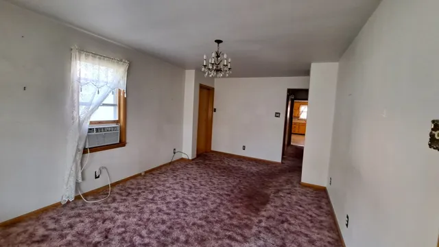 a view of a room with a window