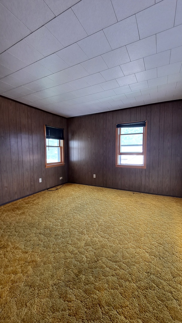 12 7th Street LaSalle, IL 61301 - Photo 6 of 16 a view of an empty room with window and closet area