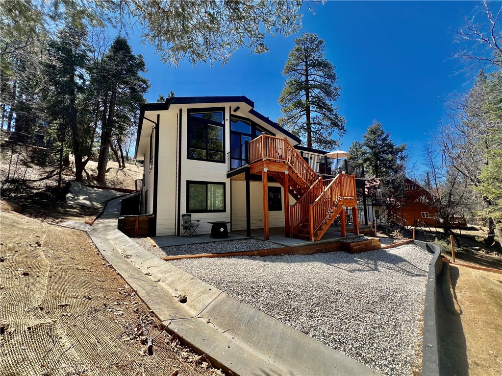 43290 Shasta Road Big Bear Lake, CA 92315 - Photo 12 of 36 a view of a house with a yard
