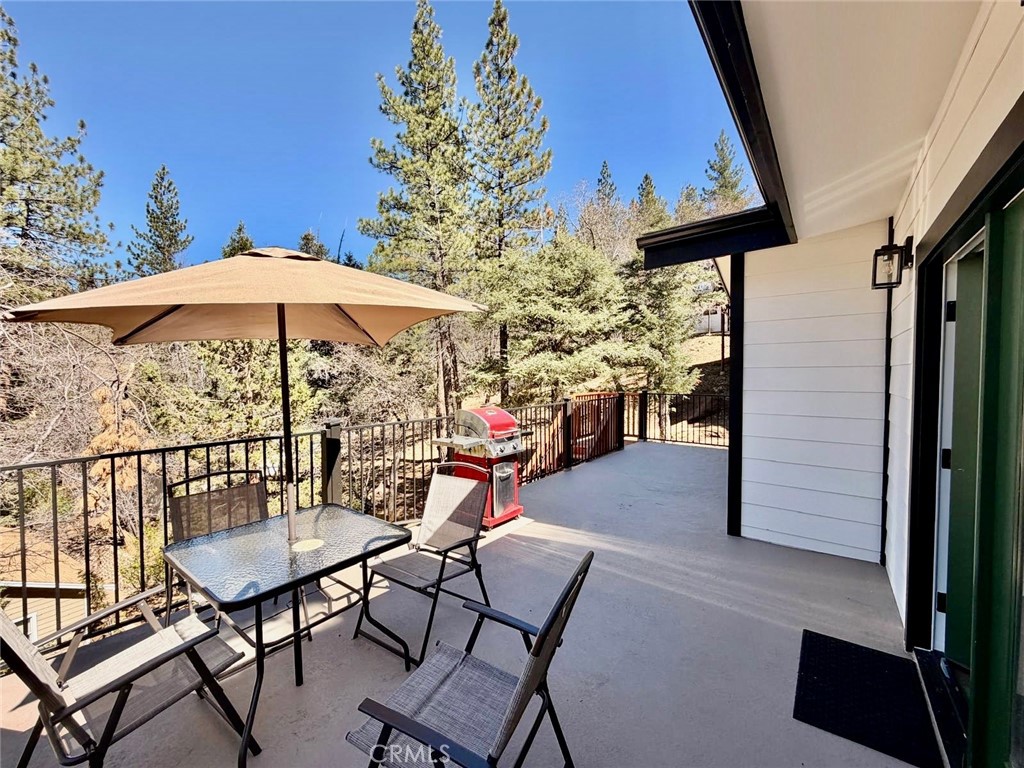 43290 Shasta Road Big Bear Lake, CA 92315 - Photo 35 of 36 a view of a chairs and table in the balcony