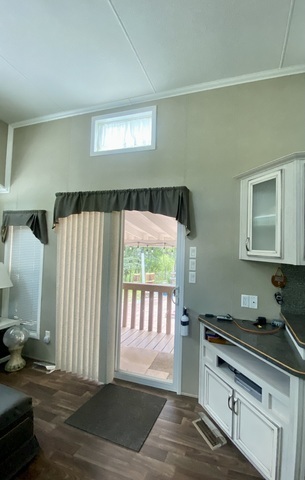 2-292 Woodhaven Sublette, IL 61367 - Photo 13 of 25 a kitchen with a sink and a large window