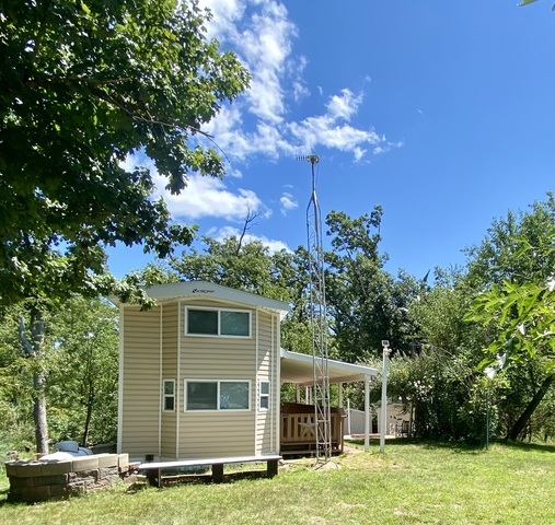 2-292 Woodhaven Sublette, IL 61367 - Photo 3 of 25 a view of a house with a yard