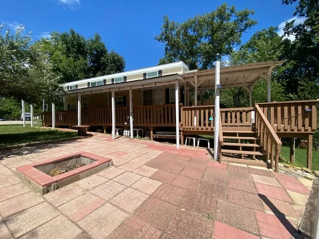 a house with yard in front of it