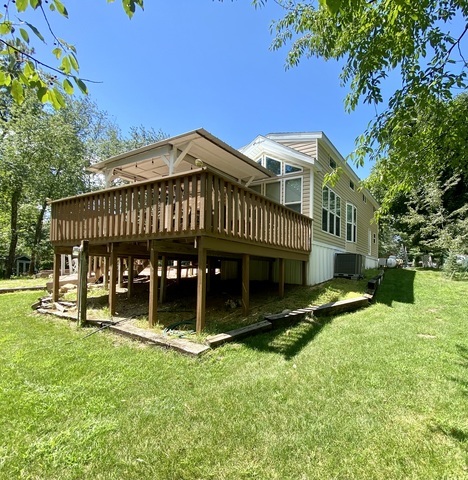 2-292 Woodhaven Sublette, IL 61367 - Photo 7 of 25 a view of a house with a yard