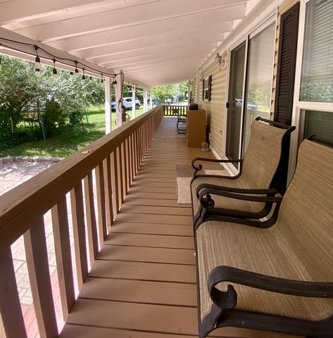 2-292 Woodhaven Sublette, IL 61367 - Photo 9 of 25 a view of a balcony with chairs