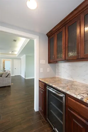 a kitchen with stainless steel appliances granite countertop a stove and a sink