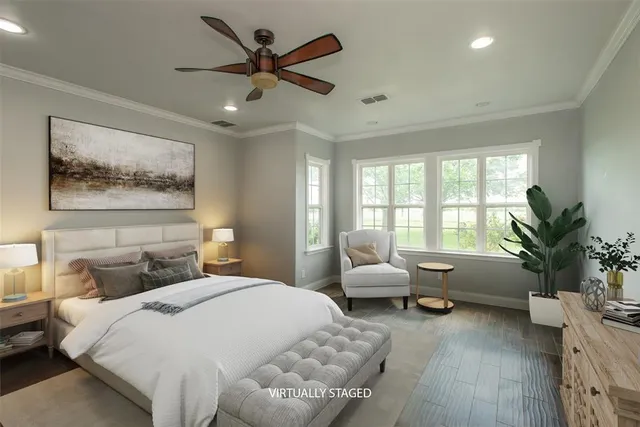 a bedroom with a large bed and a couch