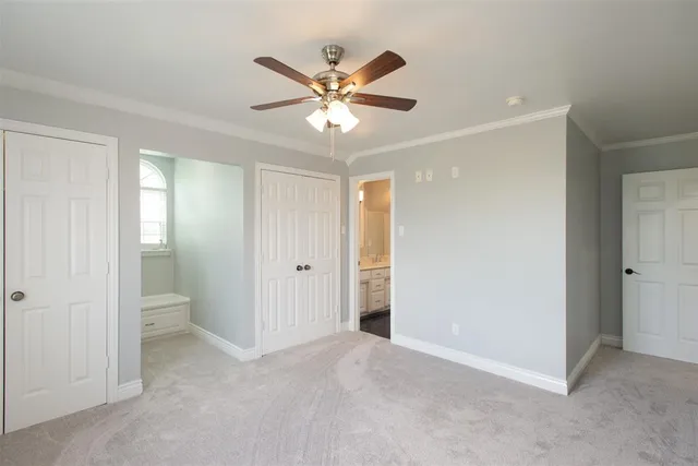 a view of a livingroom with a ceiling fan