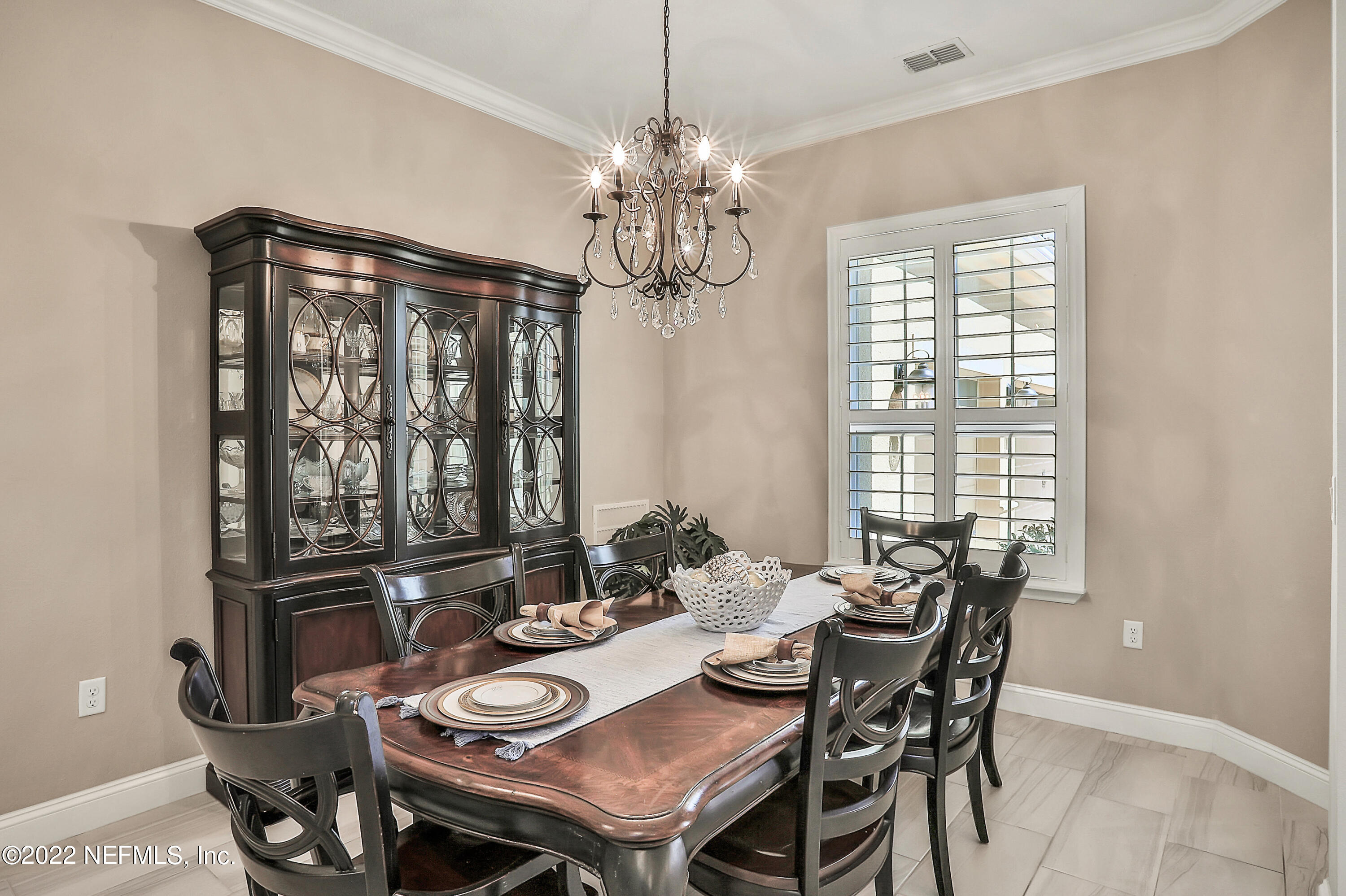 143 Barbella Circle St. Augustine, FL 32095 - Photo 11 of 95 a view of a dining room with furniture window and outside view