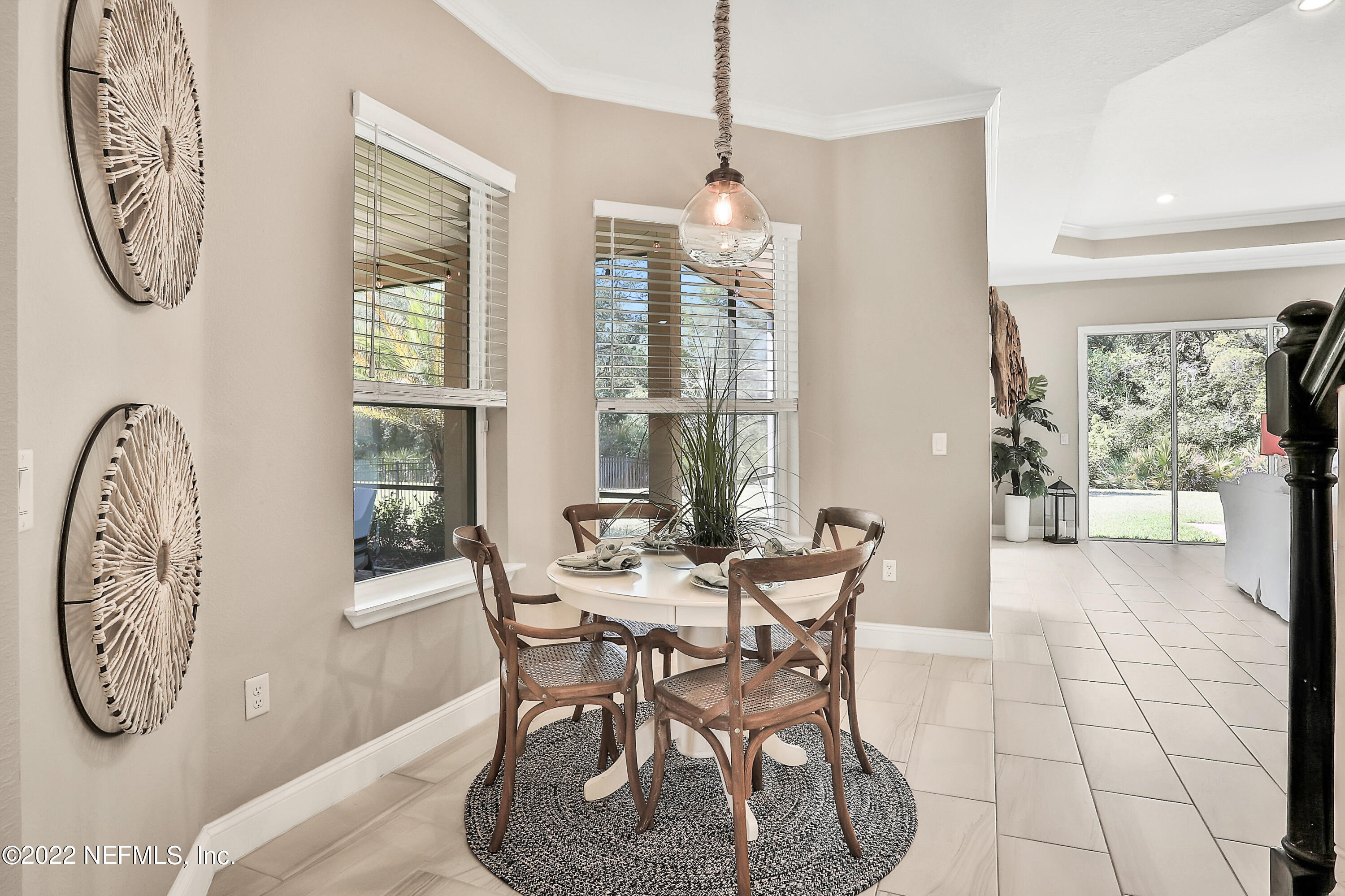 143 Barbella Circle St. Augustine, FL 32095 - Photo 16 of 95 a view of a dining room with furniture and window