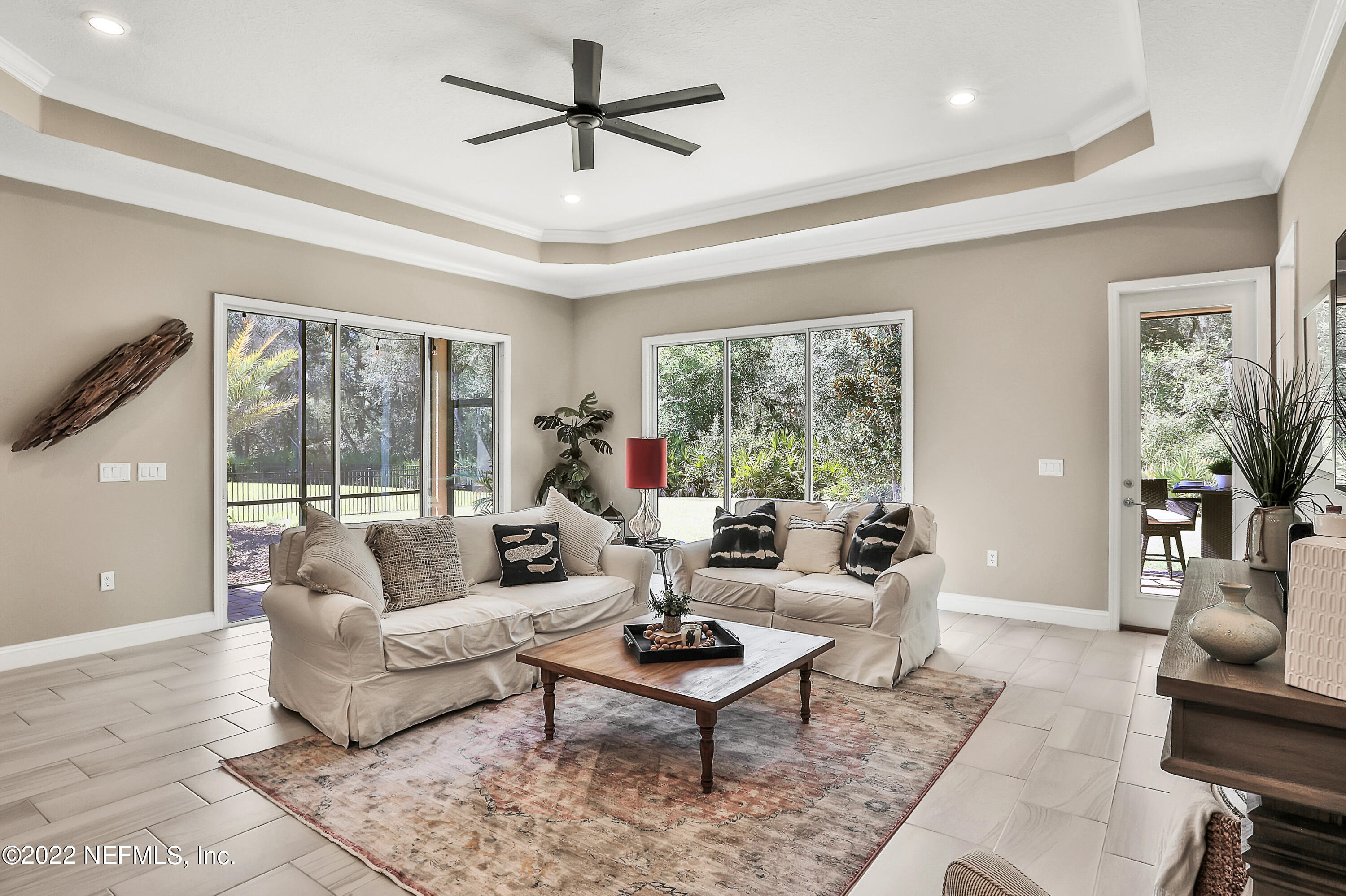 143 Barbella Circle St. Augustine, FL 32095 - Photo 19 of 95 a living room with furniture and a large window