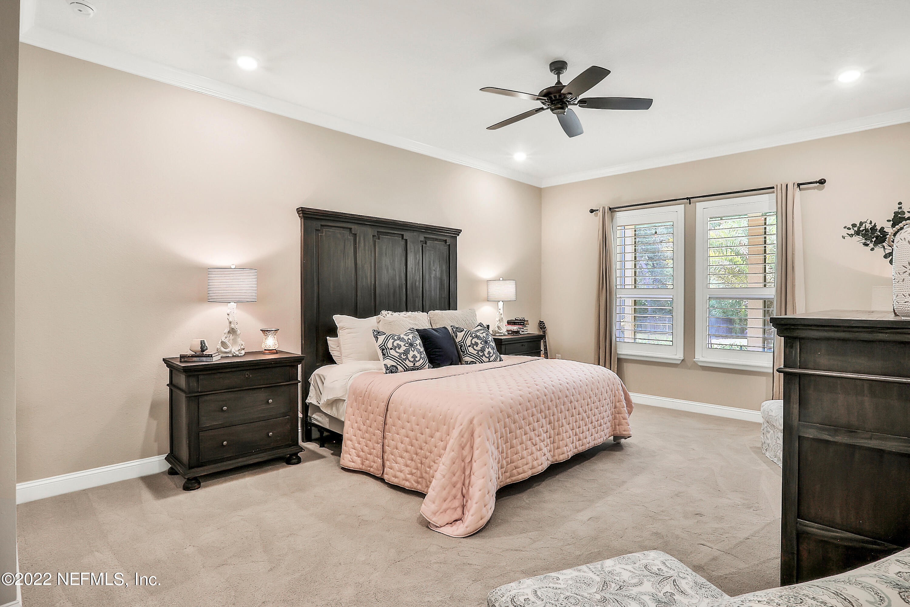 143 Barbella Circle St. Augustine, FL 32095 - Photo 29 of 95 a bedroom with a bed and window