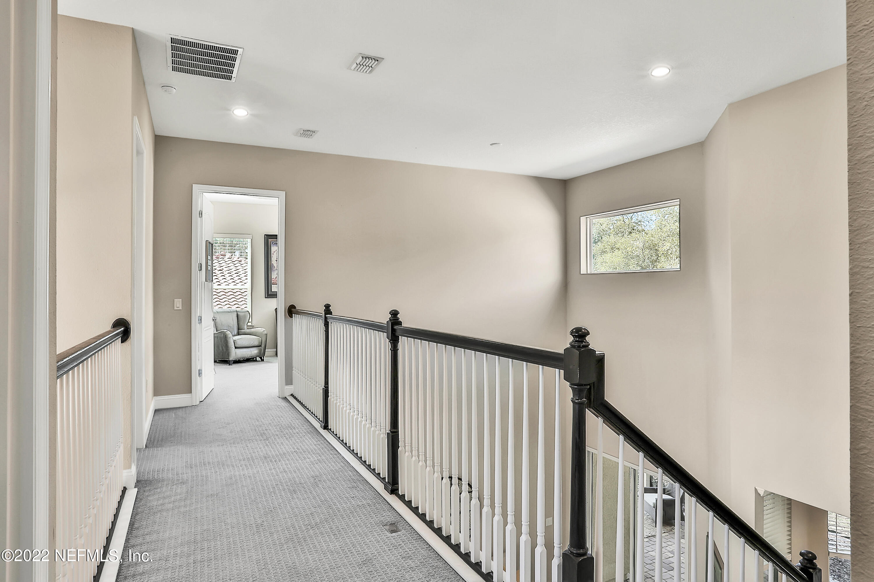 143 Barbella Circle St. Augustine, FL 32095 - Photo 40 of 95 a view of a hallway with a staircase