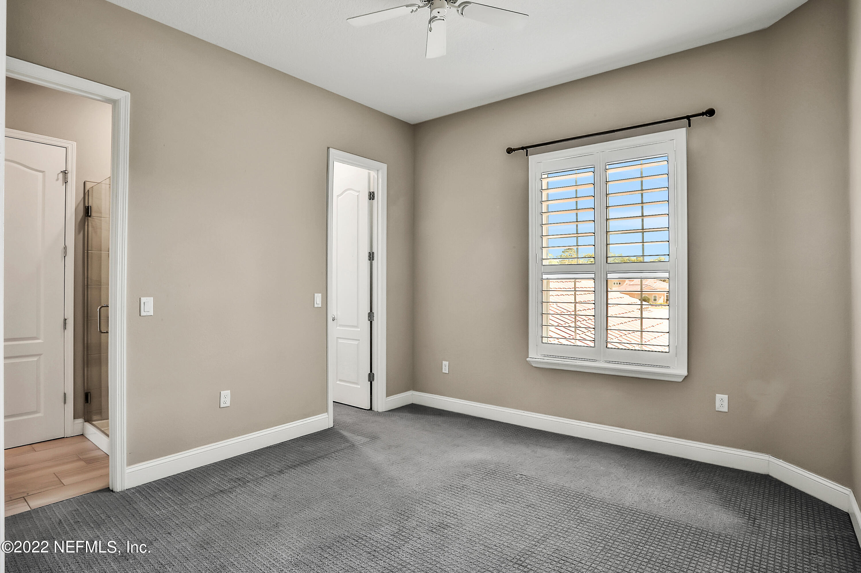 143 Barbella Circle St. Augustine, FL 32095 - Photo 48 of 95 an empty room with windows and closet