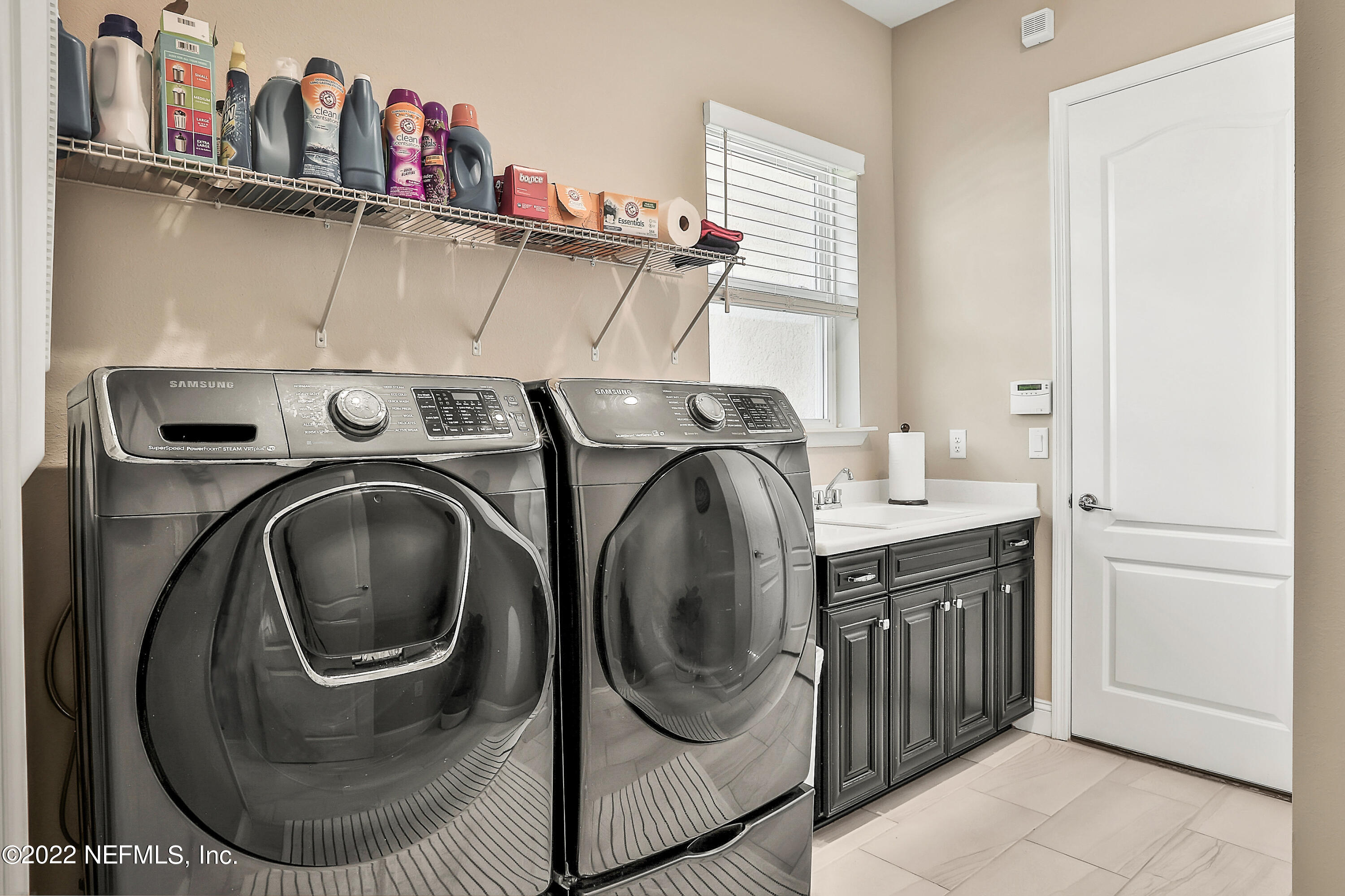 143 Barbella Circle St. Augustine, FL 32095 - Photo 56 of 95 a utility room with dryer and washer