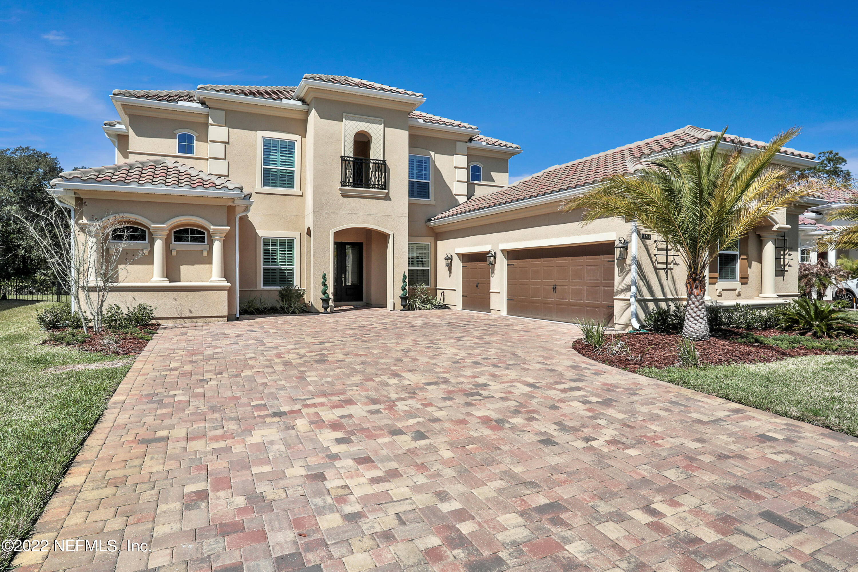 143 Barbella Circle St. Augustine, FL 32095 - Photo 65 of 95 a front view of a house with a yard