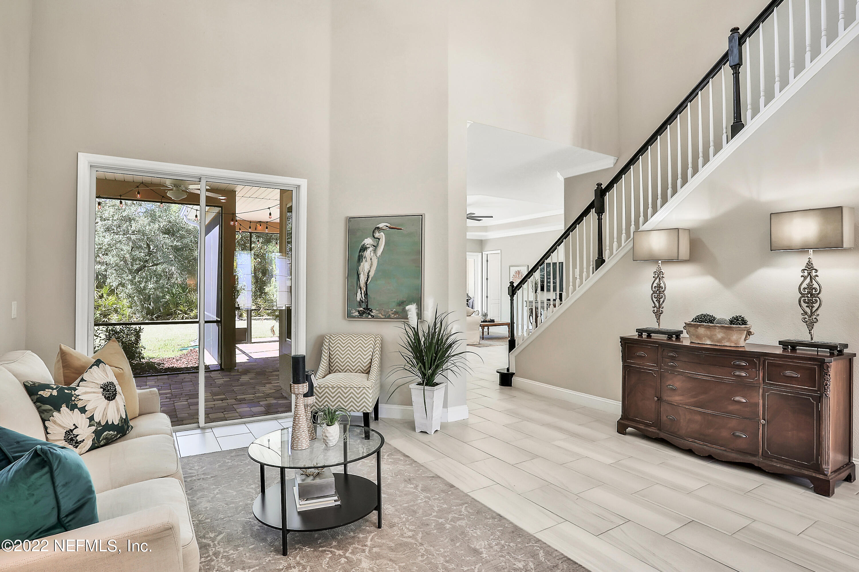 143 Barbella Circle St. Augustine, FL 32095 - Photo 8 of 95 a living room with furniture and stairs