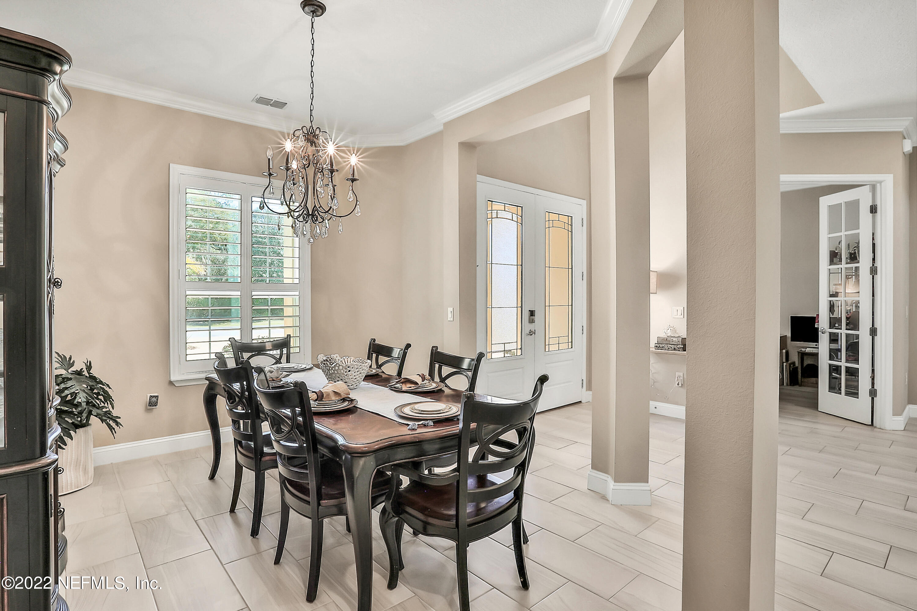 143 Barbella Circle St. Augustine, FL 32095 - Photo 10 of 95 a view of a dining room with furniture window and outside view