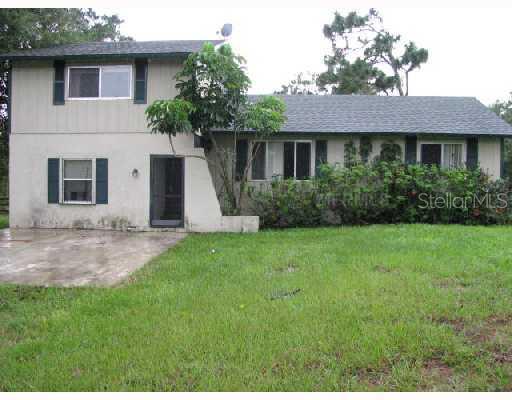 34849 Washington Loop Road Punta Gorda, FL 33982 - Photo 1 of 1 Exterior Front - Front of home on wonderful 2 + acre lot