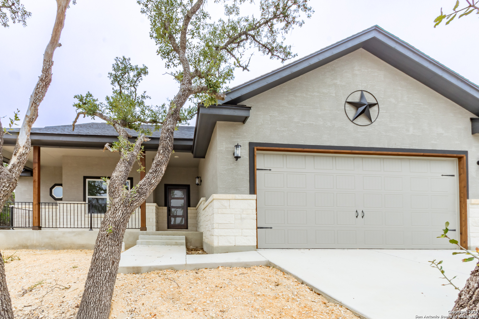 a view of a house with a snow in the background