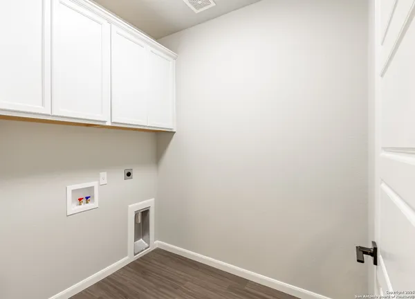 a view of kitchen with wooden floor