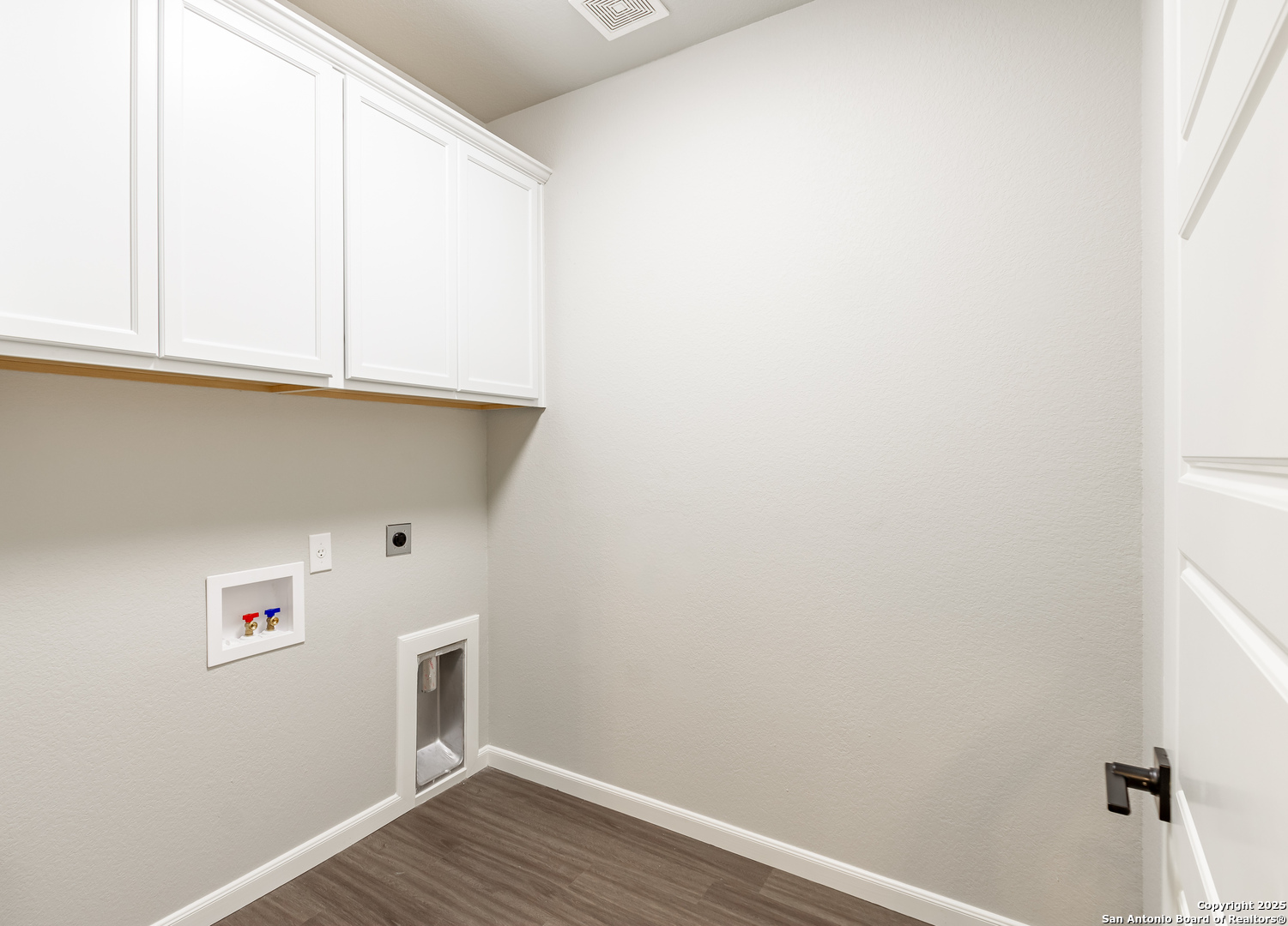 1841 Cottonwood Road Fischer, TX 78623 - Photo 38 of 45 a view of kitchen with wooden floor