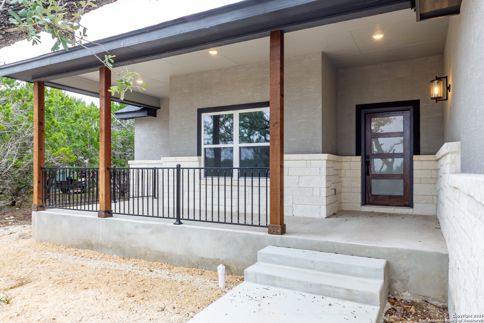 1841 Cottonwood Road Fischer, TX 78623 - Photo 9 of 45 a view of a porch with wooden floor and outdoor space