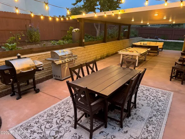 a view of a terrace with furniture