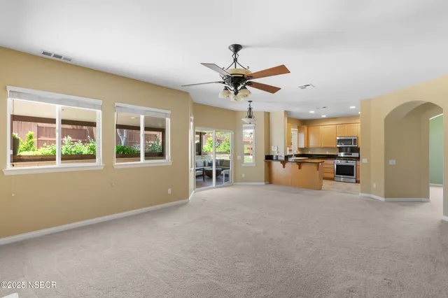 a view of a kitchen with a sink and a kitchen
