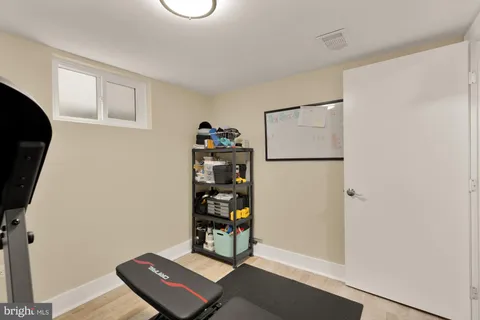 a view of workspace with wooden floor