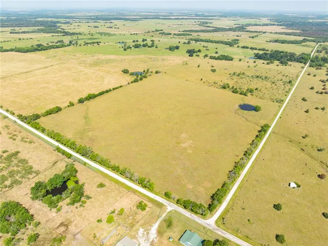 a view of an ocean and city