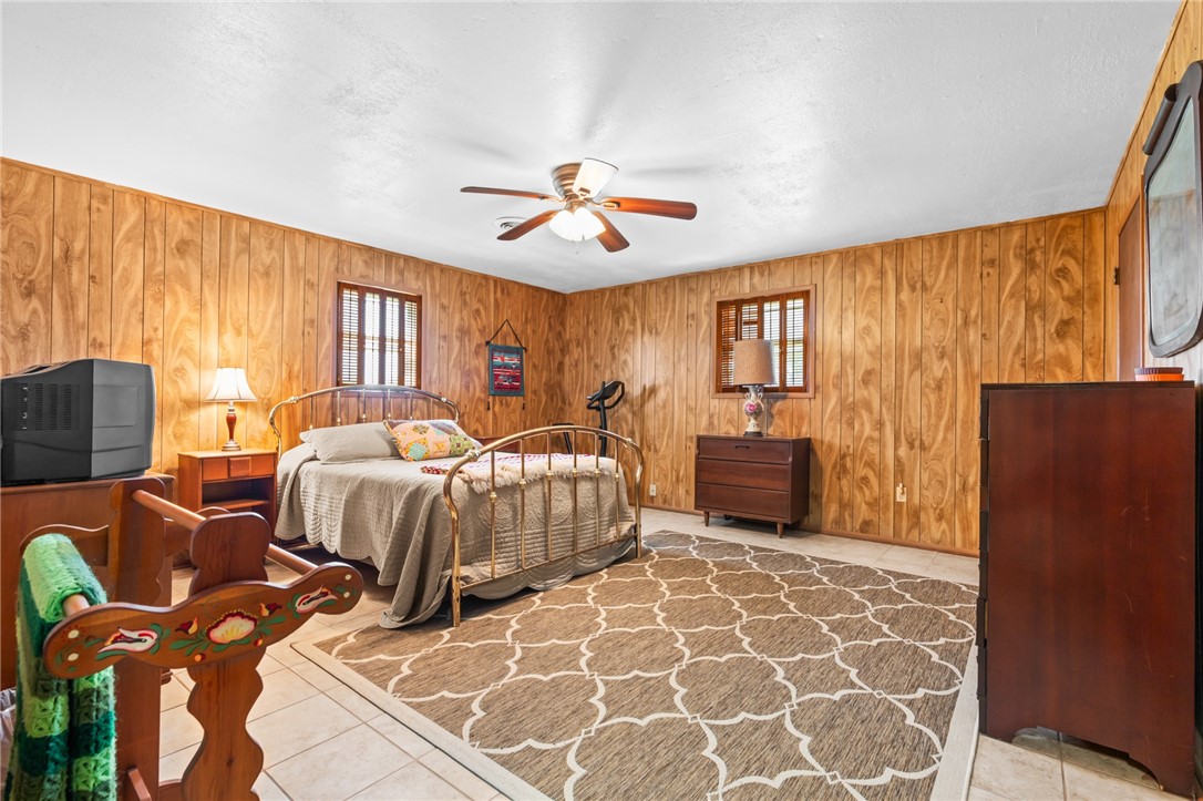 654 Lcr 654 Road Thornton, TX 76687 - Photo 51 of 64 a bed room with two beds and a chair