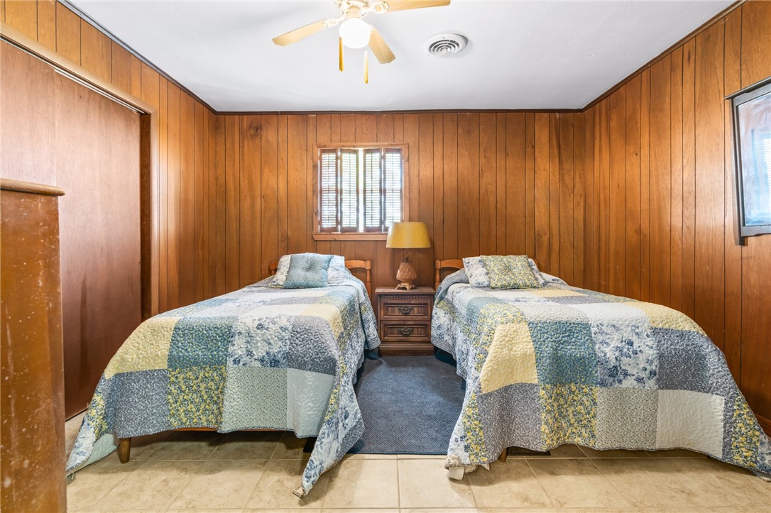 654 Lcr 654 Road Thornton, TX 76687 - Photo 56 of 64 a bedroom with two beds and painted walls