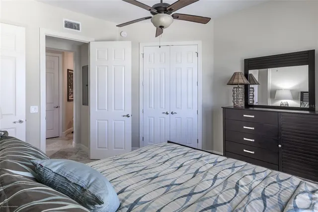 a view of a lake with a house in the background